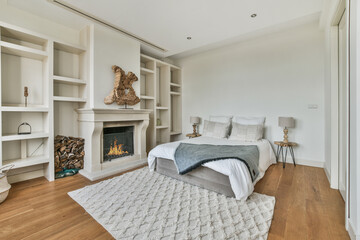 A chic bedroom with a double soft bed and a carpet
