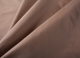 Close up of texture of hand woven Thai silk n earth tone color
