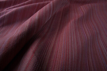 Close up of texture of hand woven cotton cloth, Thai cotton natural color dyed