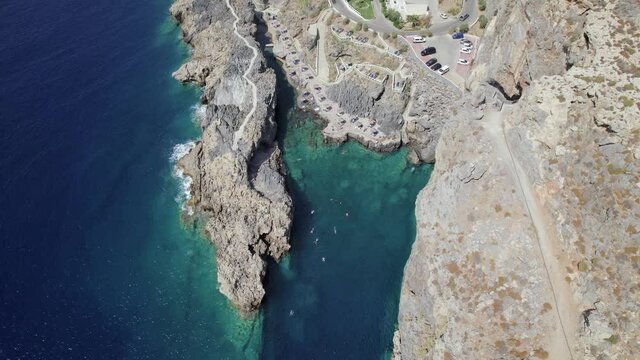 Drone footage of the Kalupso wild beach, Cretan village blue logons, coral reefs, rocky hills. Aerial mountain view. Crete island is a Mediterranean paradise.