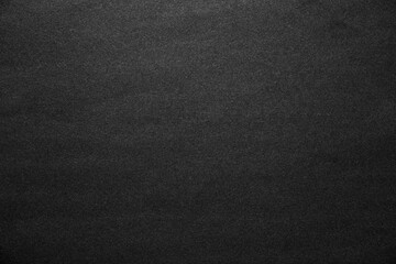Fototapeta na wymiar Smooth paper background with clean black abstract texture.