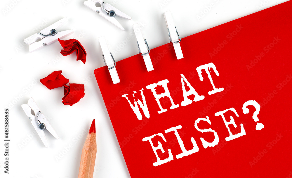 Aufkleber what else text on the red paper with office tools on white background