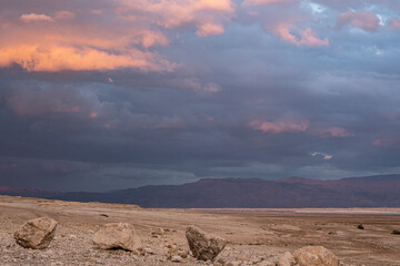 Golden sunset hours view, as seen from the Dead Sea western coastline when looking eastbound,...