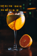 Aperol spritz in a glass with ice and orange