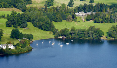 Views of Leeming House near the shore of Ullswater lake from Swarth Fell in the English Lake District, England, UK.