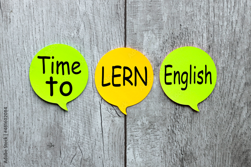 Poster time to learn english reminder notes in different colors isolated on chalkboard