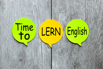 Time to learn english Reminder notes in different colors isolated on chalkboard