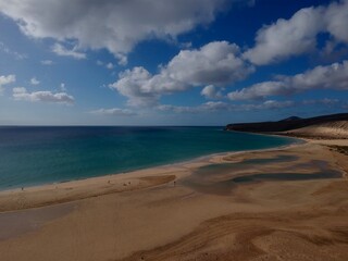 Beach with sky and clouds