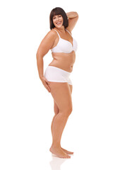 Obraz premium Her confidence is irresistible. Full length studio shot of a young model in underwear isolated on white.