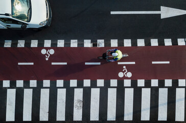 Aerial view of a cyclist riding on a cycle path