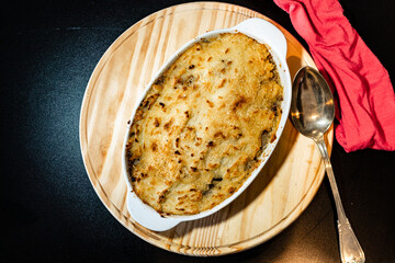 Traditional potato pie or shepherd's pie made with meat and topped with potatoes. Homemade traditional cake. Aerial view.
