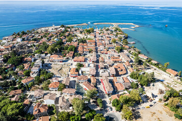 Naklejka premium Aerial drone View Of Side Antique City . Side Old Town amphitheater. Side Harbor marina in Antalya Turkey drone photo view