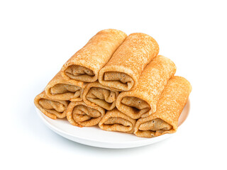 Thin stuffed pancakes isolated on a white background. Mardi gras.