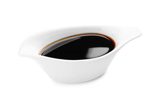 Bowl of soy sauce isolated on white