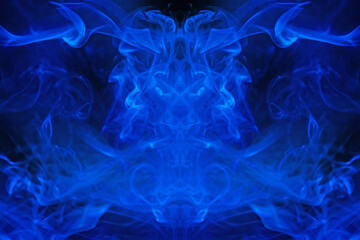 Blue smoke motion on black background.
