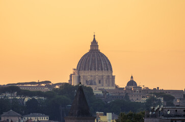 Saint Peter's Basilica dome seen from the Orange Trees Garden (Giardino degli Aranci) at sunset...
