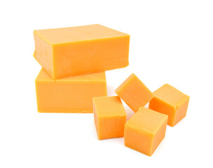 Cubes of cheddar cheese isolated on white  - 481616614