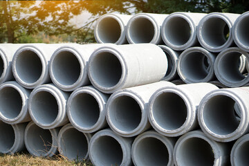 Drainage Cement pipes for construction placed outdoor. Concept :  Industry manufacturing of cement products in Thailand.         