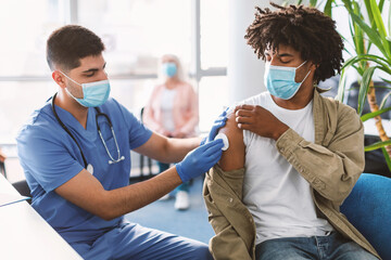 Black Man Preparing To Get Vaccinated Against Corona Virus