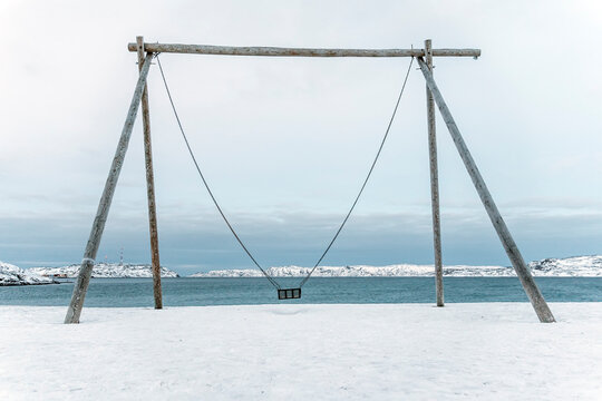 Swings on the coast of Arctic ocean, the Kola Peninsula, Teriberka, Russia