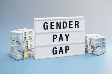 Gender pay gap concept: Two heaps of 100 dollar notes with different height and a lightbox with the...