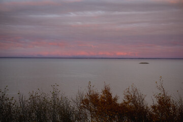 Fototapeta na wymiar Coast near the Tatar Strait at sunset