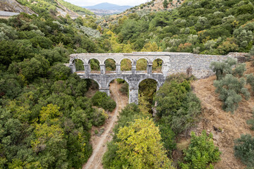 Ruins of ancient Pollio aqueduct bringe in Izmir Province. Turkey