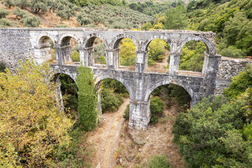 Fototapeta premium Ruins of ancient Pollio aqueduct bringe in Izmir Province. Turkey