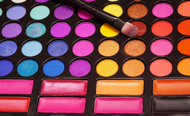  Makeup cosmetics set. Cosmetic beauty product. Beauty blogger concept. Make-up Eye Shadows, Blush, lipstick. Bright colors.