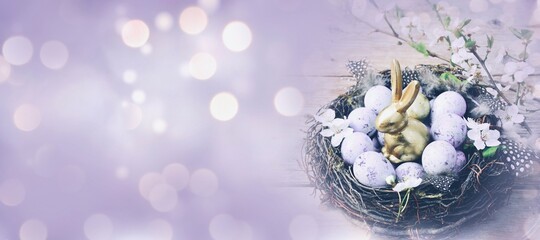  Easter background - eggs in a basket on a wooden table - purple easter background banner with bokeh light