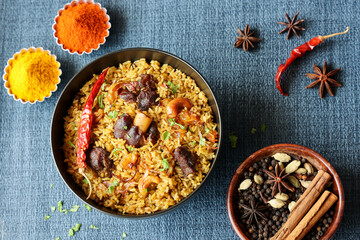Mutton biryani Beef Biryani, Gosht or lamb biriyani Hyderabadi Dum biriyani with raita yoghurt dip special occasion Indian festival food Ramadan , Eid Hyderabad Kerala India Sri Lanka. Lankan food.