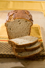 Delicious freshly baked bread, sliced and ready to serve in a homestyle setting.