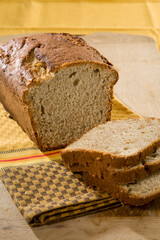 Delicious freshly baked bread, sliced and ready to serve in a homestyle setting.