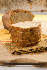 Delicious freshly baked bread, sliced and ready to serve in a homestyle setting.
