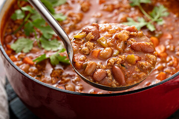Traditional chili soup with meat and red beans - obrazy, fototapety, plakaty