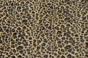 Leopard pattern background with fabric texture