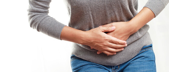 Woman having a stomachache, or menstruation pain. suffering from abdominal. Menstrual cramps....