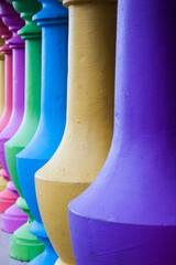 Multi-colored support columns close up.