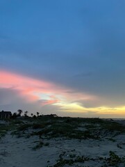 Obraz premium Sunset in North Colombia with Palms and colorful sky