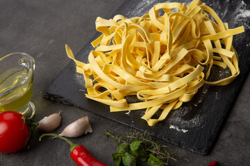 Italian pasta cooking process. Fresh food concept. Home made tagliatelle