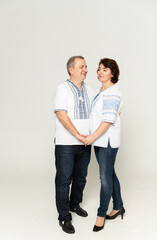 couple in embroidered shirts on a white background. people in national clothes of Ukraine on a white background.