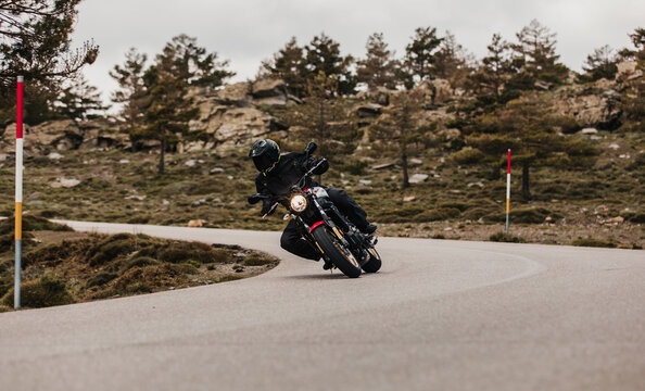 Calar Alto, Spain - May 5th 2021: Man riding a Yamaha XSR700 motorcycle in a beautiful mountain range road, during Dunlop Xperience event in Almería, Spain.