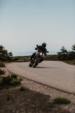 Calar Alto, Spain - May 5th 2021: Man riding a Yamaha XSR700 motorcycle in a beautiful mountain road, during Dunlop Xperience event in Almería, Spain.