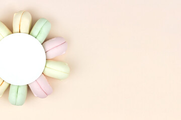 Colorful marshmallow macaroonsTop view. Gourmet Colored Macaroon Cookies. Free space for text.
