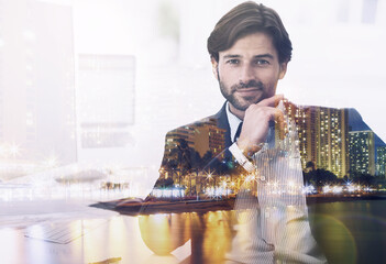 He's taking this city by storm. Multiple exposure shot of a young businessman superimposed on a urban skyline at night.