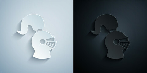 Paper cut Medieval iron helmet for head protection icon isolated on grey and black background. Knight helmet. Paper art style. Vector