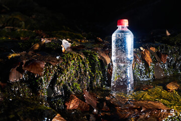 Plastic bottle with drinking water.