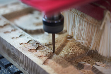 CNC woodworking machine. Furniture manufacturing. - obrazy, fototapety, plakaty