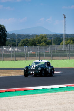 60s vintage race car competition on racetrack, Austin Healey 3000 Mk2