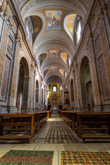 Obraz premium The Cathedral of Santa Maria Assunta (Sutri) . Central nave with Frescoes on the vaulted ceiling chapel, altar and apse. 